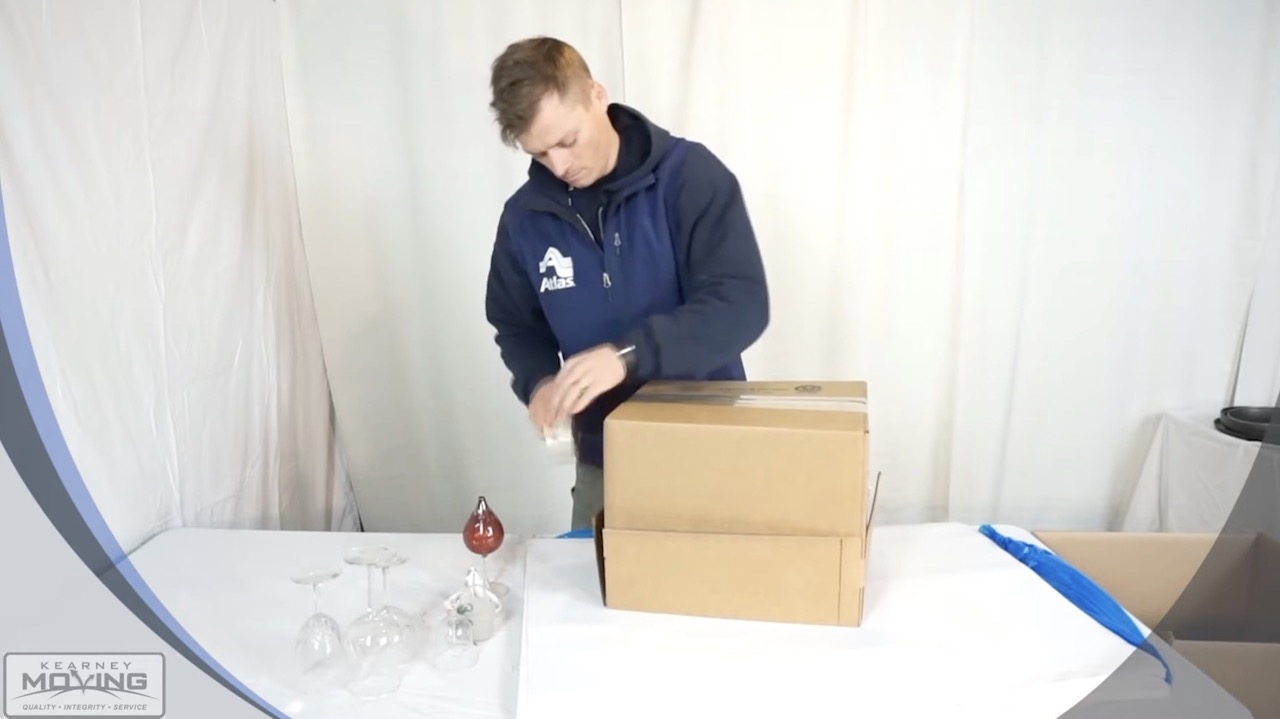 How to tape and label a moving box